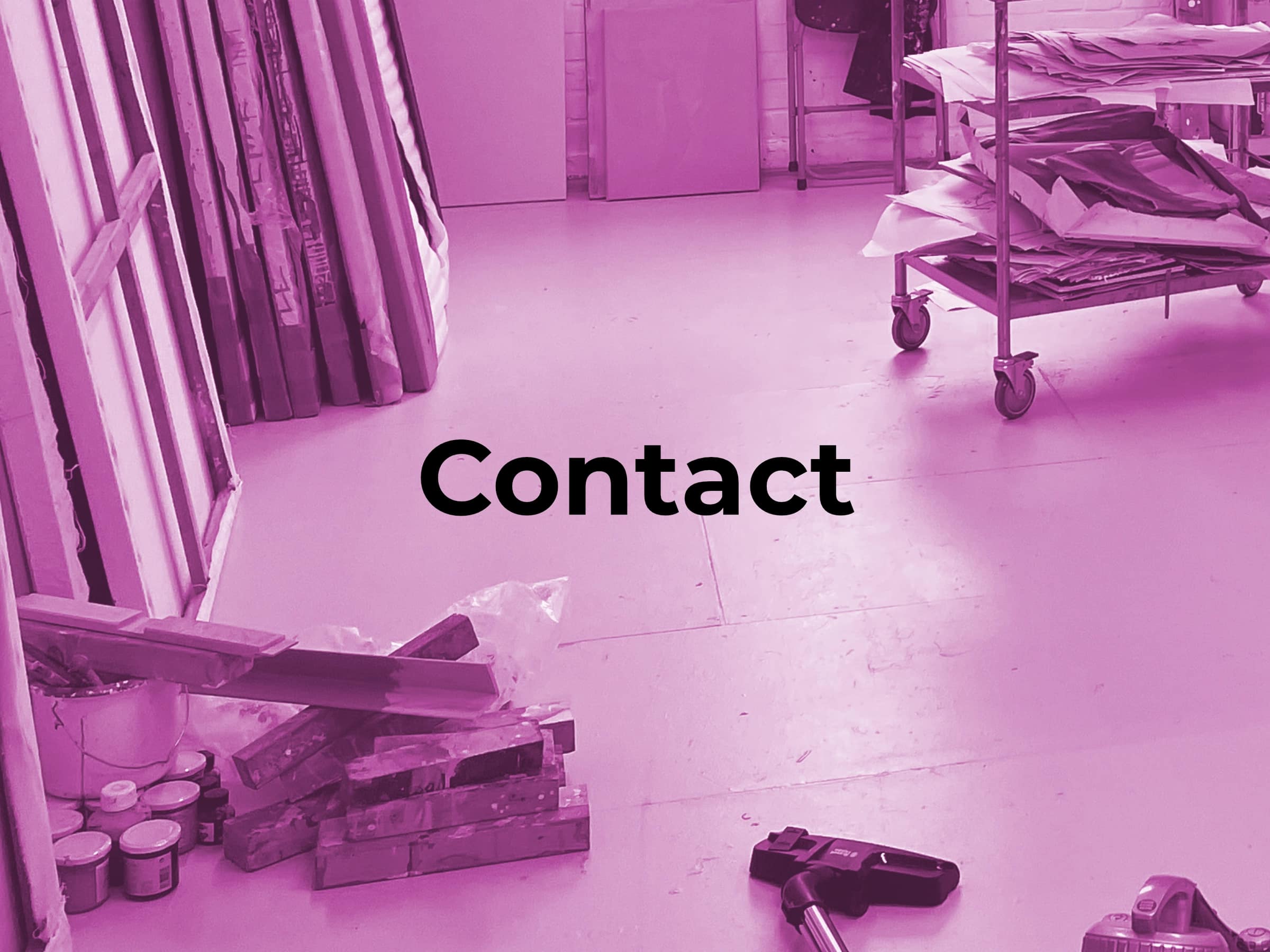 Interior of Daniel Pettitt's London painting studio with stretched canvases, materials and equipment